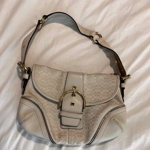original crème and golf coach purse